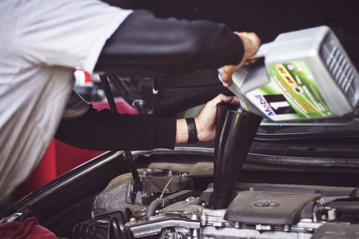 Mechanic working on a vehicle in a workshop
